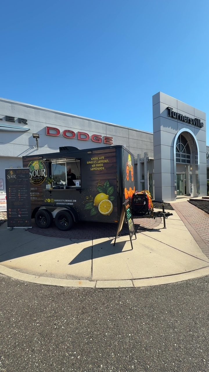 The Sour Society trailer set up outside Turnersville Dodge